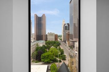 A view of the chicago skyline from the top of a building